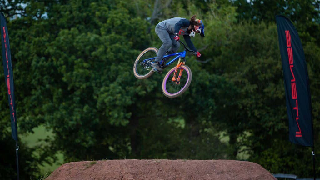 Mountain biker in the air rotating 360